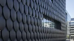 Facade of dark metal scales, video